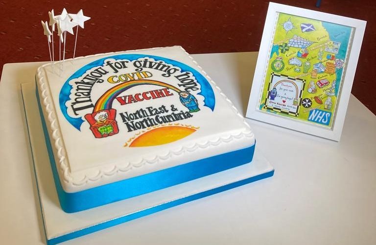 Picture of Covid vaccine 1st year anniversary cake